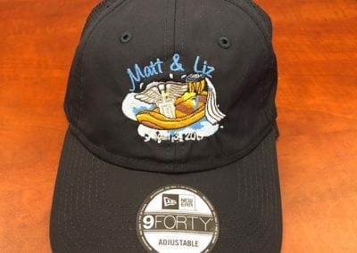 Matt and Liz custom logo embroidered on a black cap